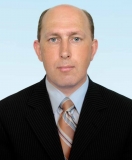 Доцент кафедри кримінально-правових дисциплін ДДУВС, кандидат юридичних наук, доцент Телійчук Віталій Григорович